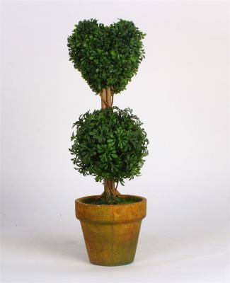 Petite salle de bain d&#39;intérieur avec fausses plantes