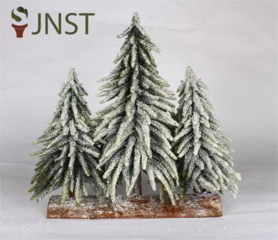 Petit arbre de Noël pour Noël avec base en bois